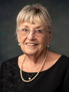 Photo of Marianne Shenefelt in a Library